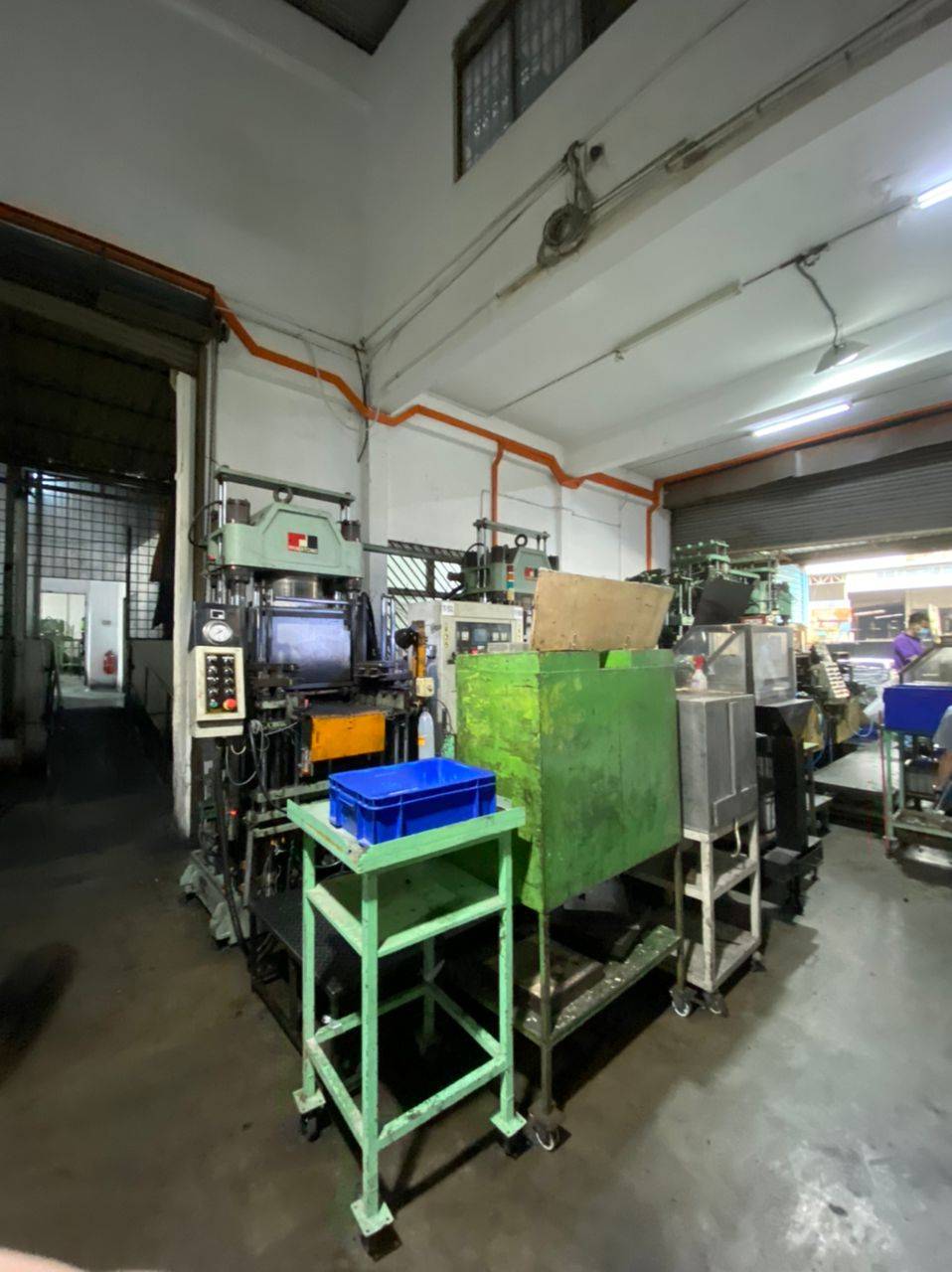 Rubber compression machine in shop floor